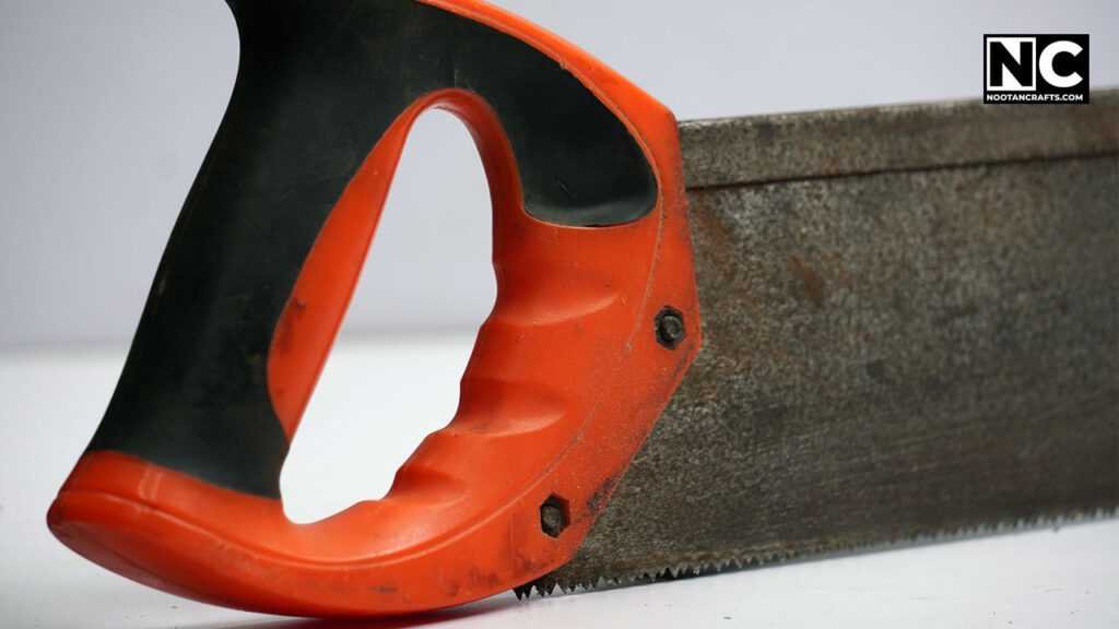 handle of a cross cut saw