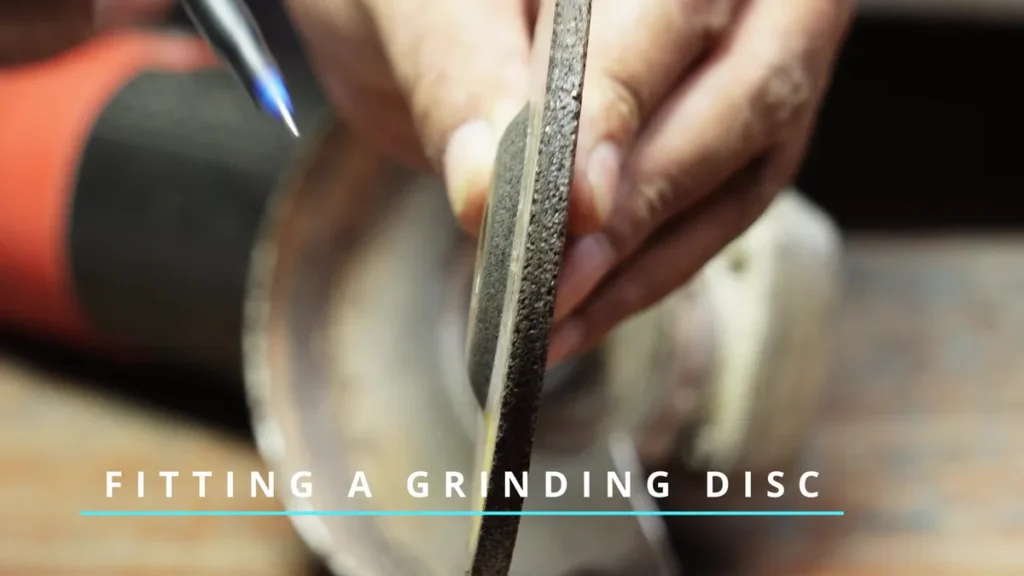 how to put a grinder disk on an angle grinder