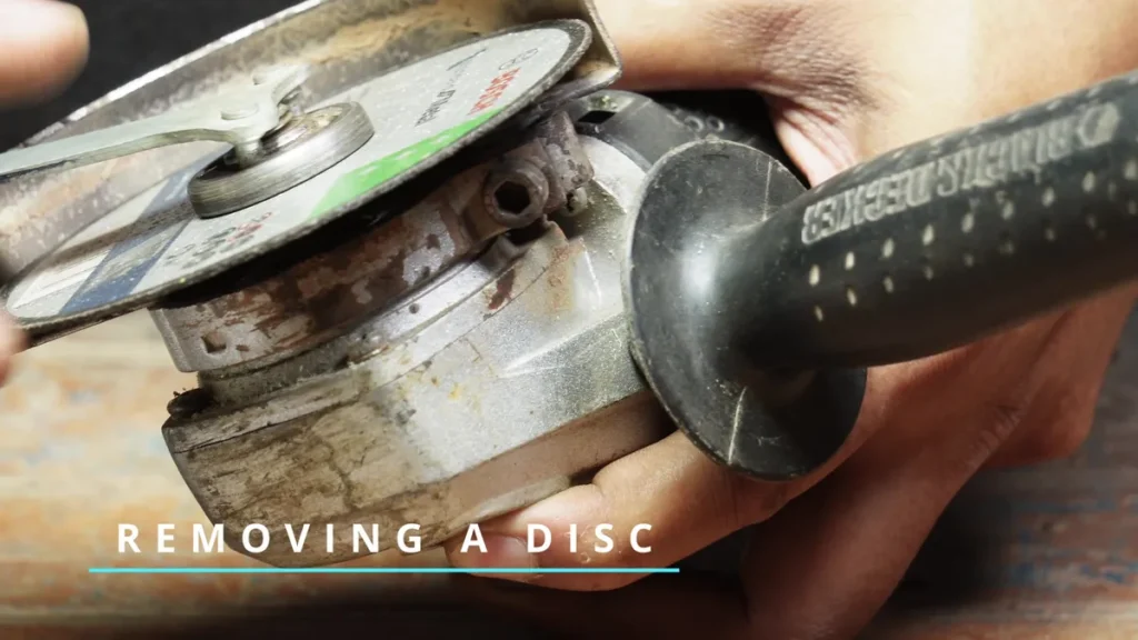 how to remove a disk from an angle grinder