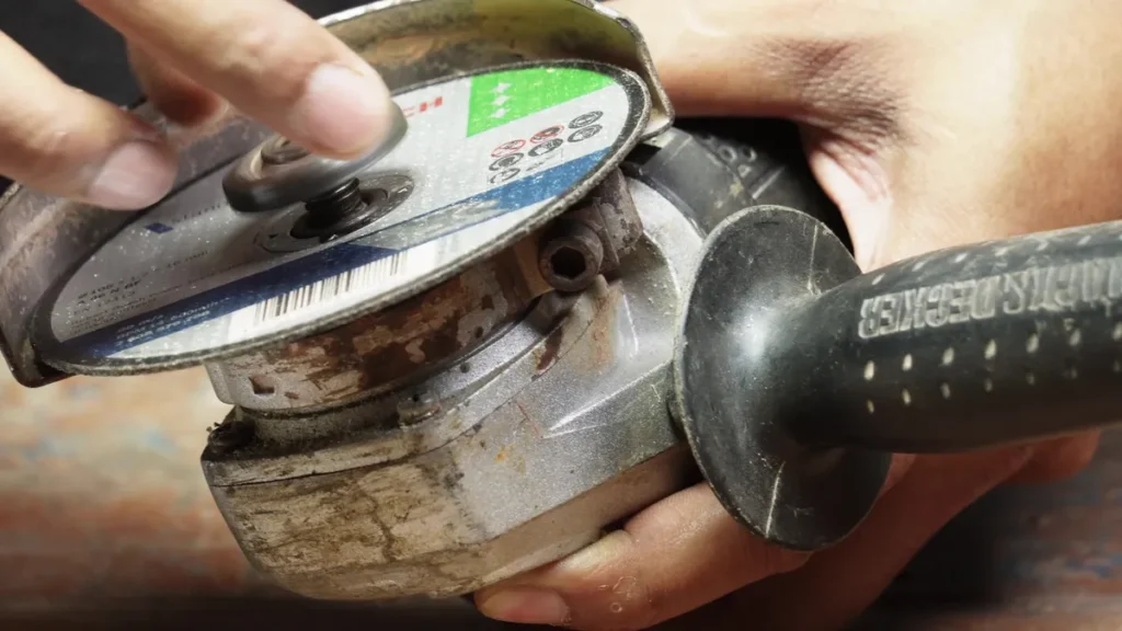 unscrew the nut in counterclockwise